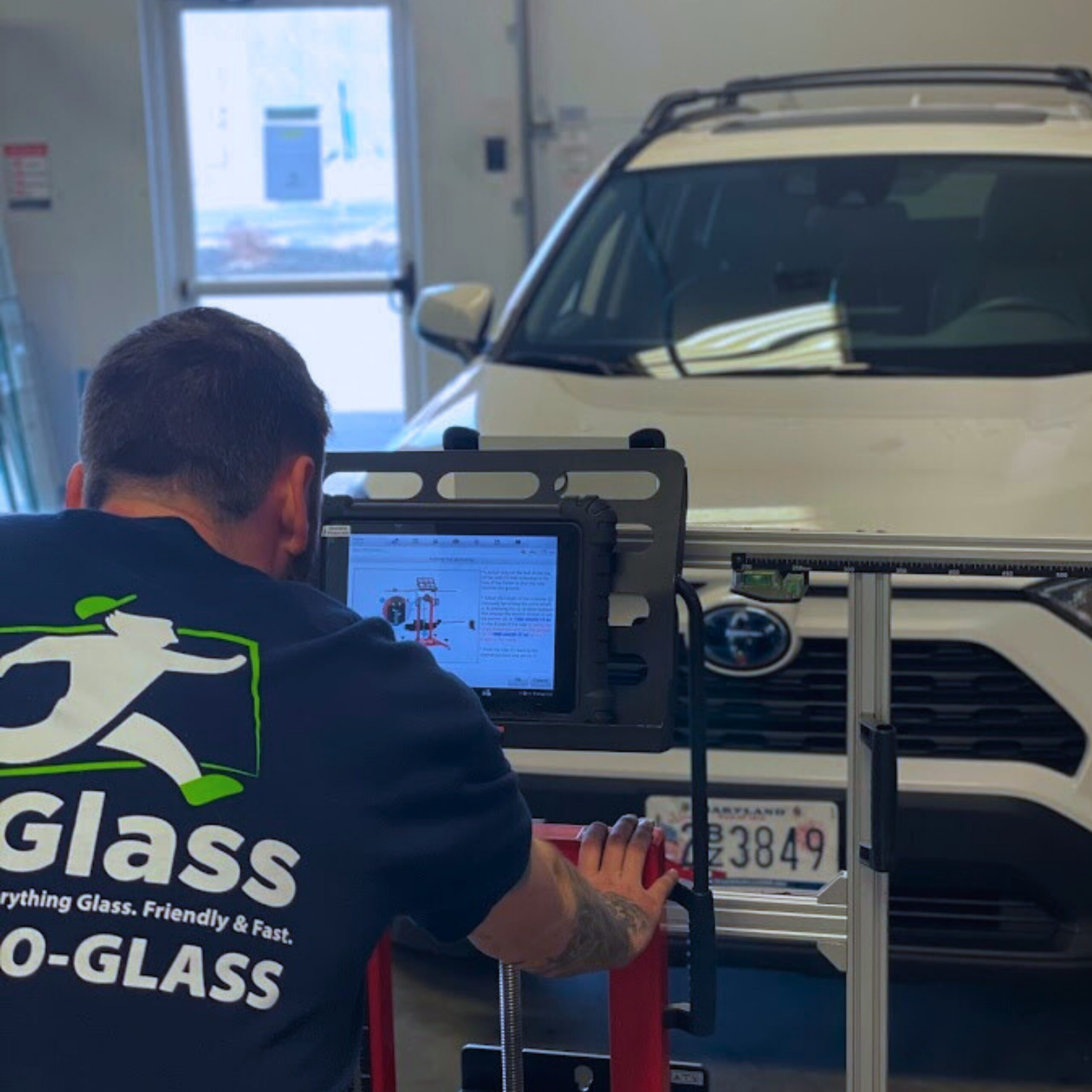 GoGlass Technician calibrating a vehicle's windshield