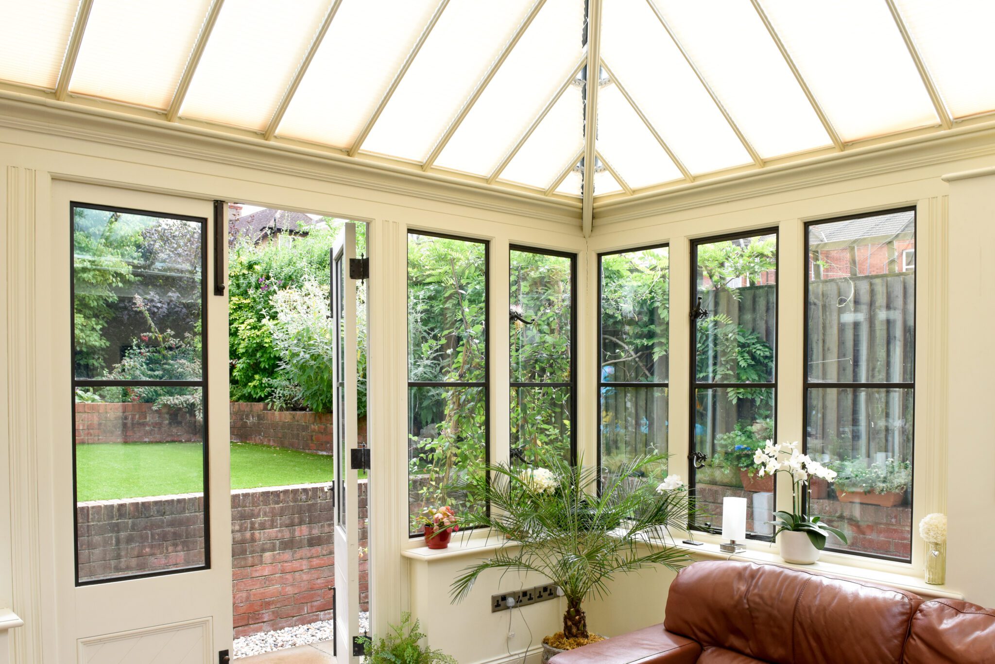 Sunroom greenhouse roof black frame windows
