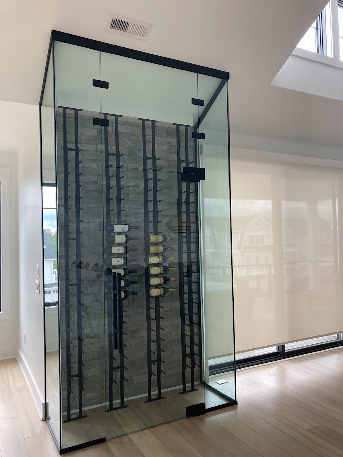 Wine Cellar with a glass enclosure around it 